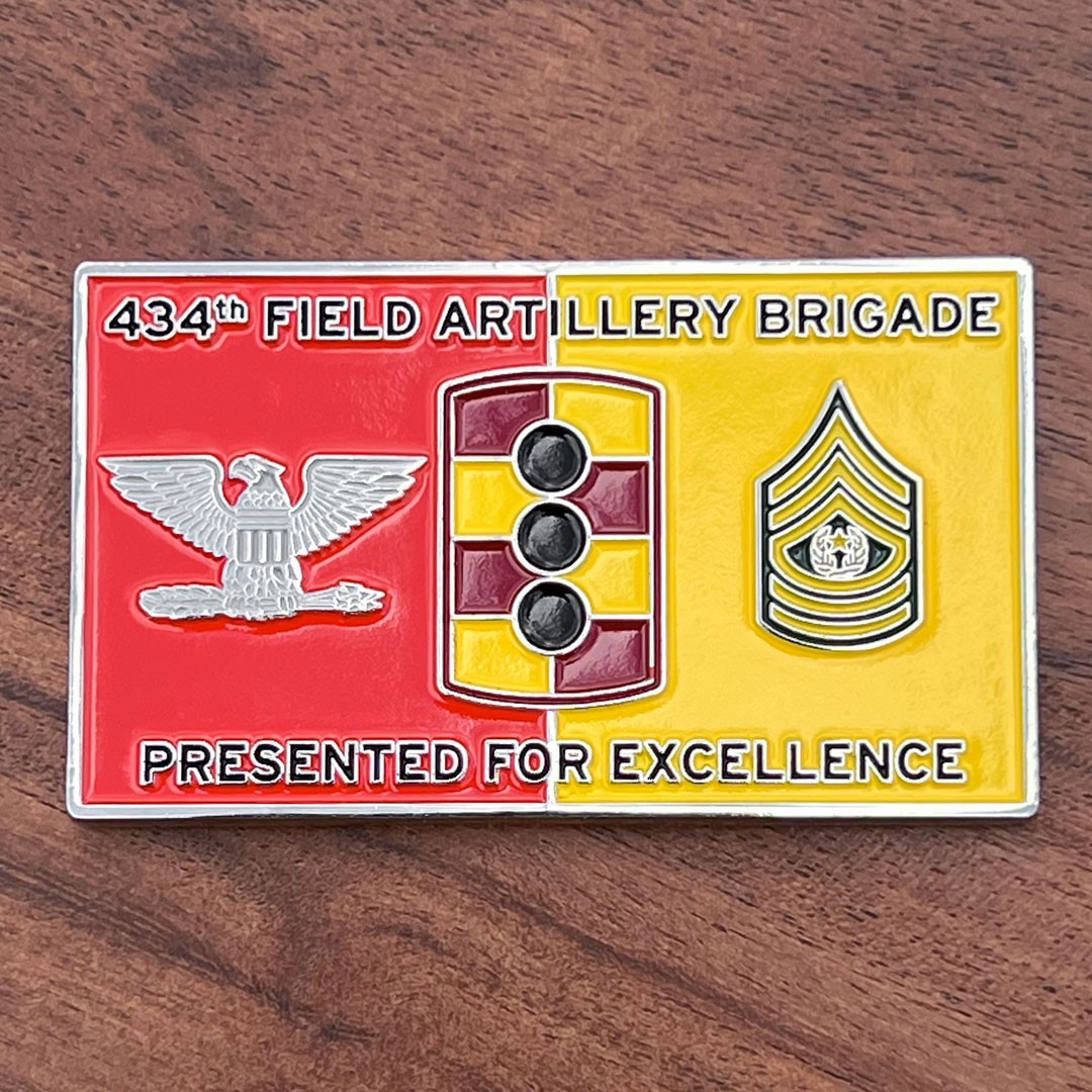 Rectangular challenge coin belonging to 434th Field Artillery Brigade