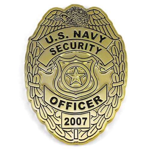 Badge shaped coin honoring U.S. Navy Security Officers