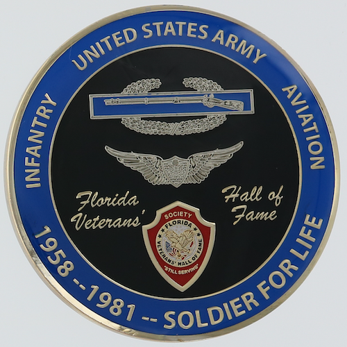 Front of polished silver challenge coin for the Florida Veterans' Hall of Fame