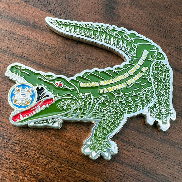 Custom shaped challenge coin representing the USCGC Crocodile. 